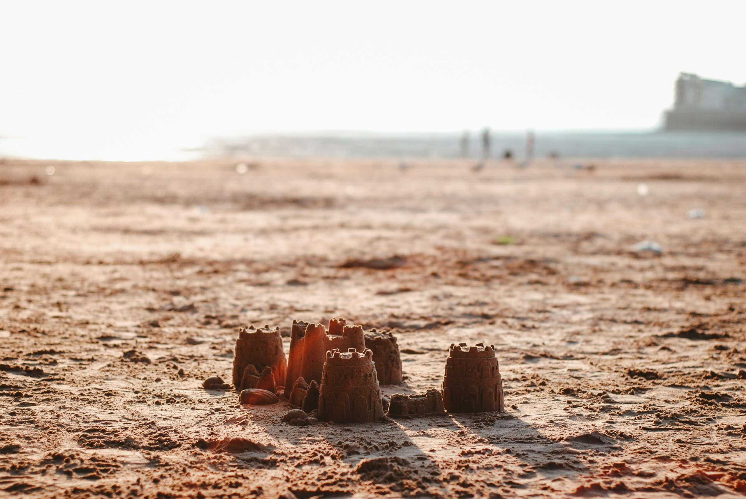 A sandcastle on a beach.